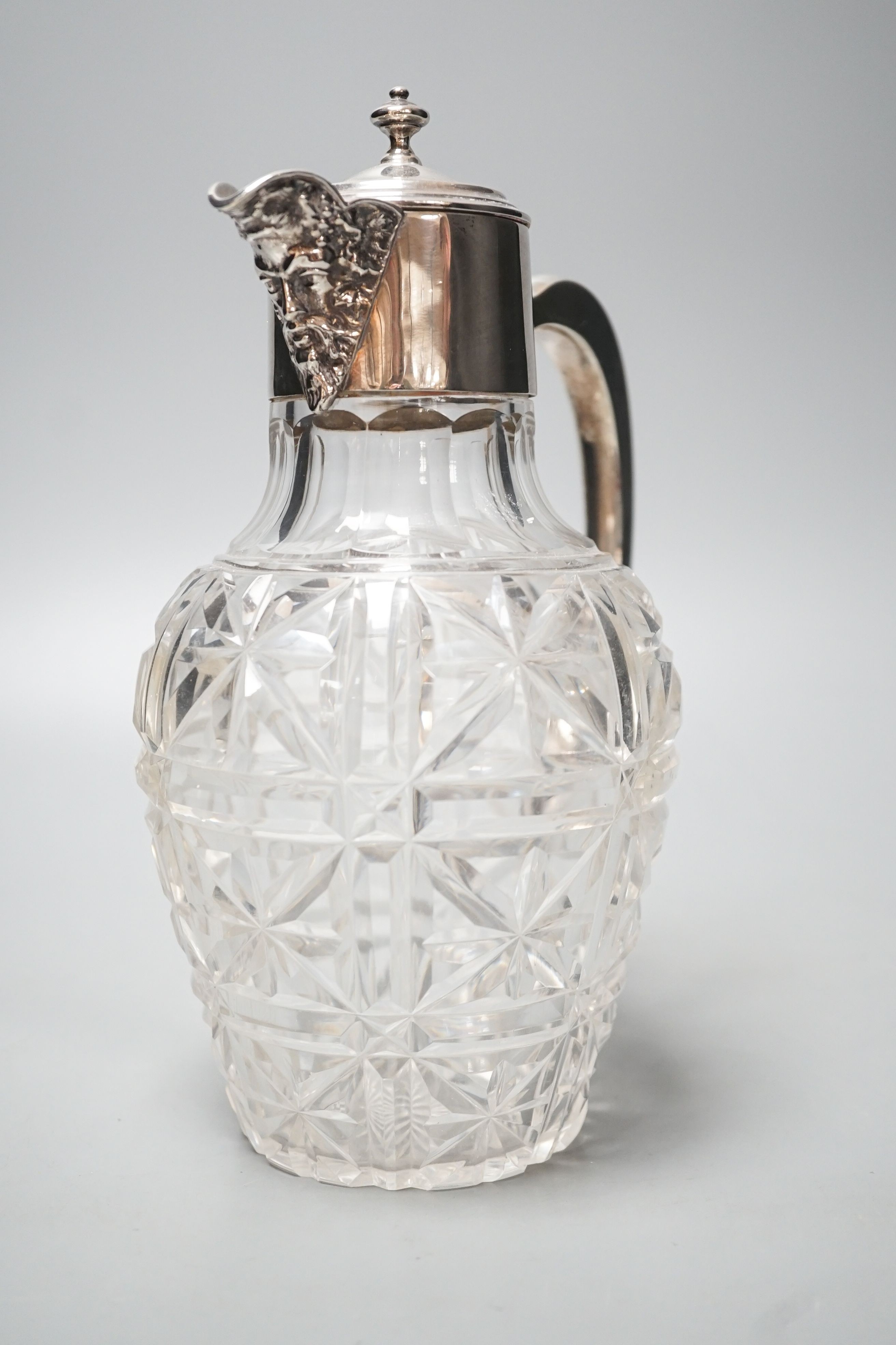 An Edwardian silver mounted cut glass claret jug, Goldsmiths & Silversmiths Co Ltd, London, 1905, 23cm.